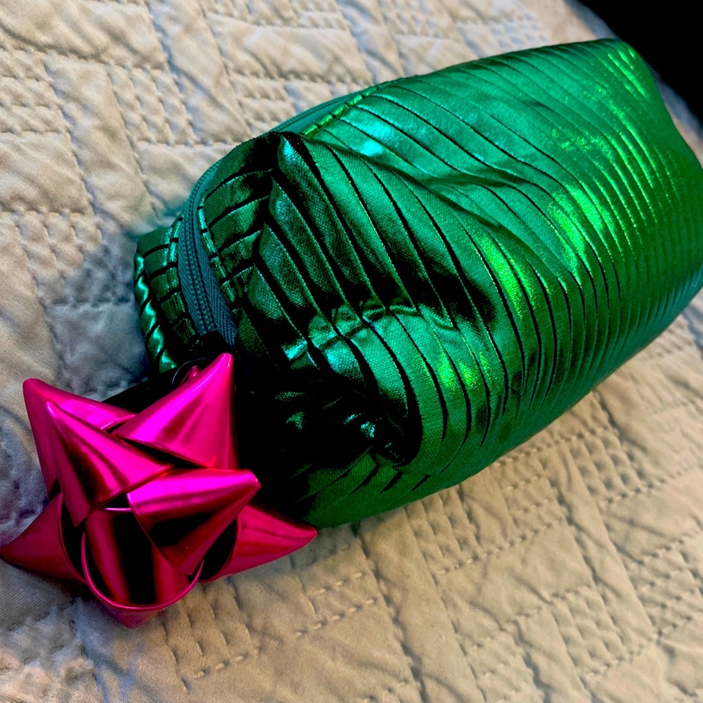 MAC cosmetics holiday collection makeup bag with bow